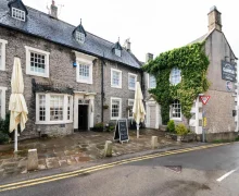 An inn and restaurant, just off the main street within the pretty village of Castleton in the Peak District