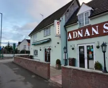 An external view of the three star  Adnans Hotel in Birmingham West Midlands in the suburb or Elmdon, the hotel is particularly well  suited for its proximity to Birmingham Airport.