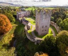 An aerial view of Appleby Castle and grounds alongside the River Eden in the Eden Valley