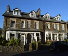 A view of the front exterior of the four-star Ellerbrook House Bed and Breakfast in Windermere, Lake District.