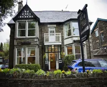 An external view of the detached  nicely presented four-star Fir Trees Guest House near Windermere and Bowness-on-Windermere in the Lake district