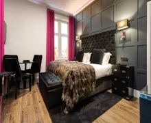 An image of a stylish bedroom  from the five-star Kotel Windermere in the stunning Lake District