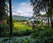 An external image of the 5-star Linthwaite House Hotel near Bowness-on-Windermere, the property is in an elevated position with views if distant fells