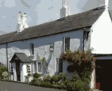 An image of the white faced 2 story property of Low Fell  B&B  near Ulverston.