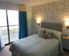 An immage of a bedroom with sea views at The Bay Horse Hotel And Restaurant  near Ulverston Cumbria.
