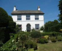 An external view of 'The Hill B&B', a white painted proprty in Ings Village 