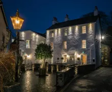 An external night time view of the 5 star 'The White House'  In Bowness-on-Windermere Lake District.
