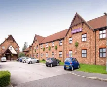 An external view of the Premier Inn Manchester Denton