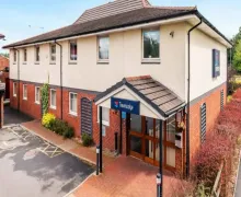 An external view of the Travelodge Oldham Chadderton
