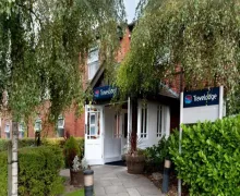 An external view of the Travelodge Warrington Lowton